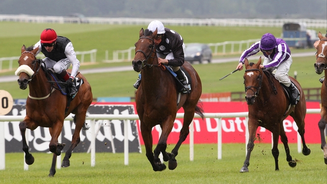 Sapphire (red cap) in action at the Curragh last season