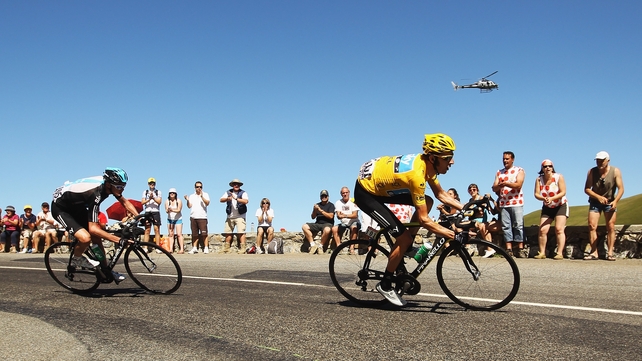 Bradley Wiggins has held onto the yellow jersey