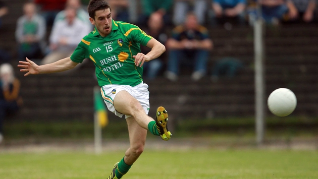 Kevin Conlon of Leitrim scores but it wasn't enough to keep them in the Championship