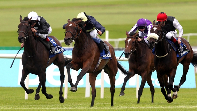 Great Heavens and William Buick (centre) go on to win the Irish Oaks at the Curragh