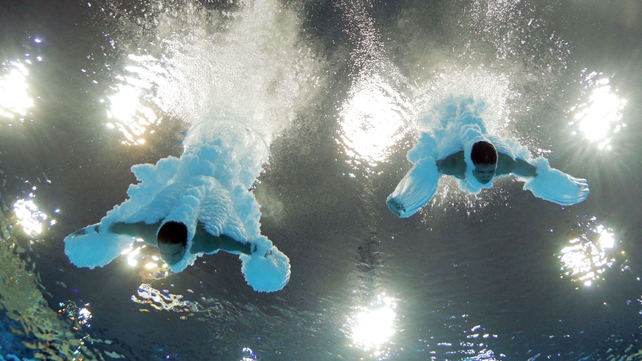 Cao Yuan and Zhang Yanquan in action at the Aquatics Centre