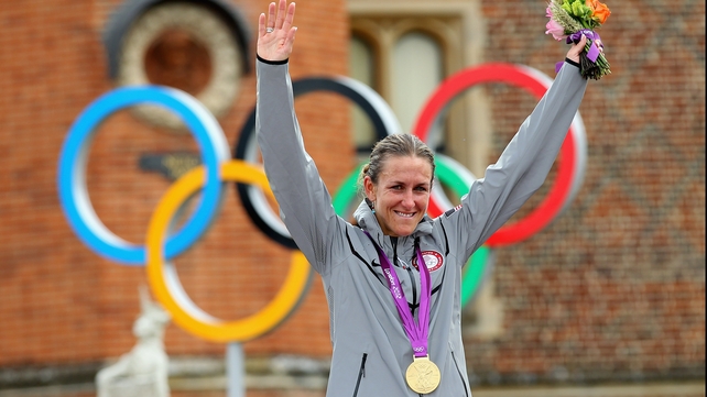 Kristin Armstrong celebrates during the medal ceremony