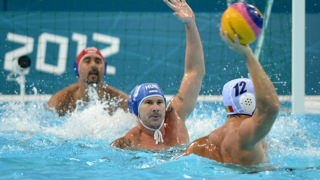 Hungary's Peter Biros attempts to block a shot on goal in the victory over Romania