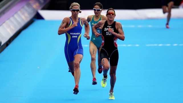 Nicola Spirig (r) of Switzerland just held the run of Sweden's Lisa Norden, to win gold in the women's triathlon