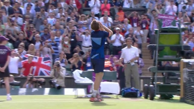 Andy Murray looks to the heavens after his resounding win against Roger Federer