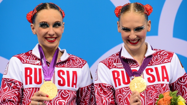 Natalia Ishchenko and Svetlana Romashina celebrate gold