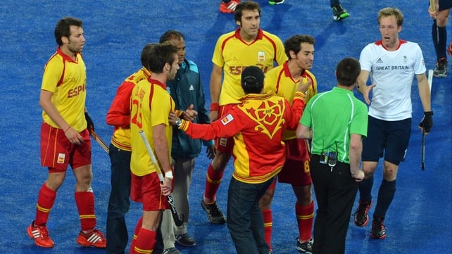 Officials prevent Spanish players interacting with umpire John Wright from South Africa