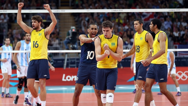 Bruno Rezende No 1 and Sergio Santos No 10 celebrate Brazil's victory