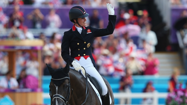 Charlotte Dujardin of Great Britain riding Valegro celebrates during the individual dressage