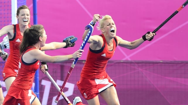 Alex Danson (right) celebrates with team-mates after scoring during the women's hockey bronze medal match against New Zealand