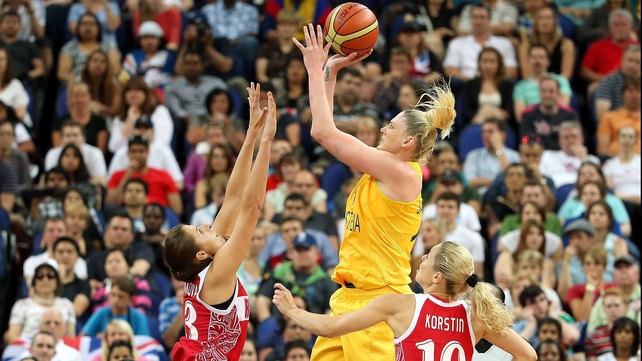 Lauren Jackson of Australia attempts a shot in the second half against Anna Petrakova (l) and Ilona Korstin (r) of Russia