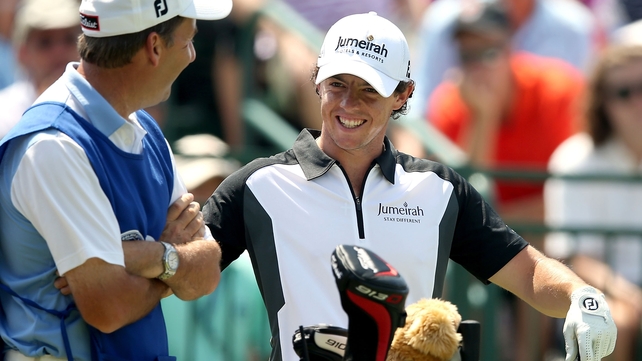 Rory McIlroy hit five birdies in the opening eight holes on Saturday to take a share of the lead