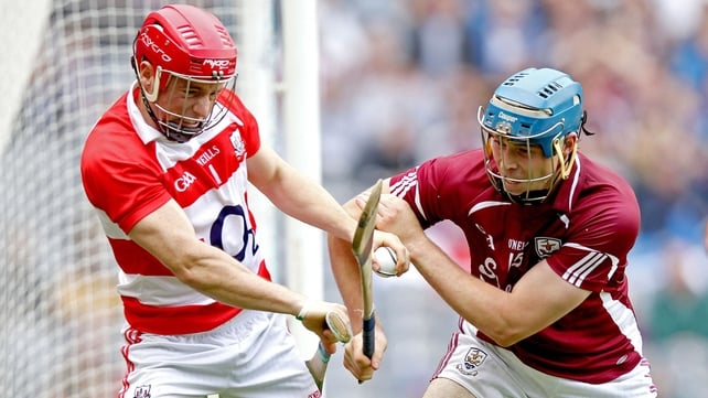 Cork goalkeeper Anthony Nash is challenged by Galway's Conor Cooney