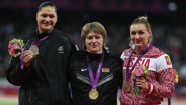 The gold medal will now go to New Zealand's Valerie Adams (left)