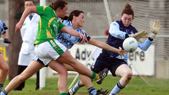 Deirdre Corridan of Kerry tries a shot on goal as Joanne O'Sullivan and Cliodhna Clarke of Dublin close in