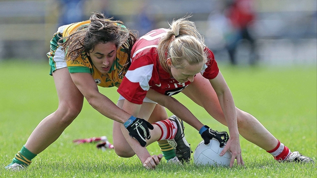 Cork's Nollaig Cleary tussles for possession with Tara Khan of Donegal