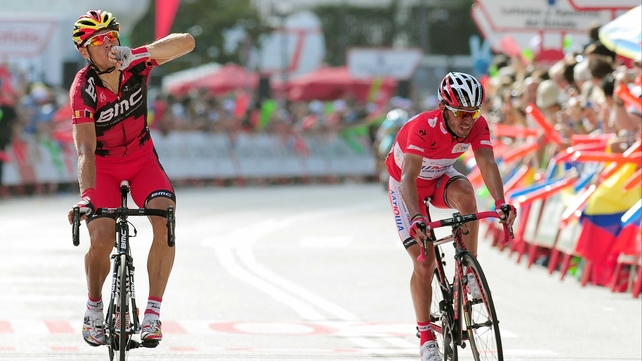 Philippe Gilbert (l) salutes after victory in the ninth stage of Vuelta a Espana, with Joaquim Rodriguez second