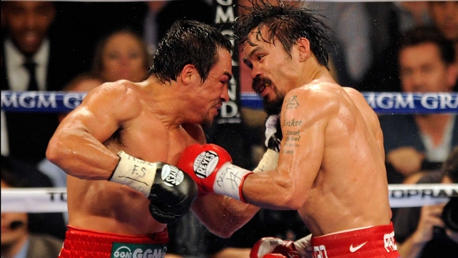Manny Pacquiao (R) on his way to victory at the MGM Grand Garden Arena last November