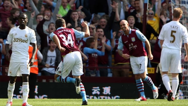 Matthew Lowton (number 34) celebrates breaking the deadlock for Aston Villa
