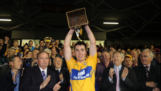 Clare captain Conor McGrath lifts the cup