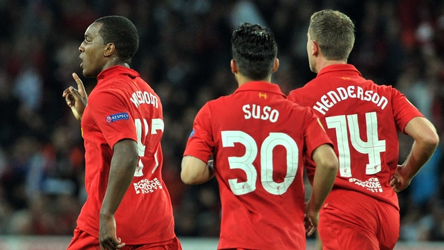 Andre Wisdom (L) marked his debut with a headed goal