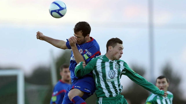 Sligo's Ross Gaynor challenges Bray's John Mulroy for a high ball