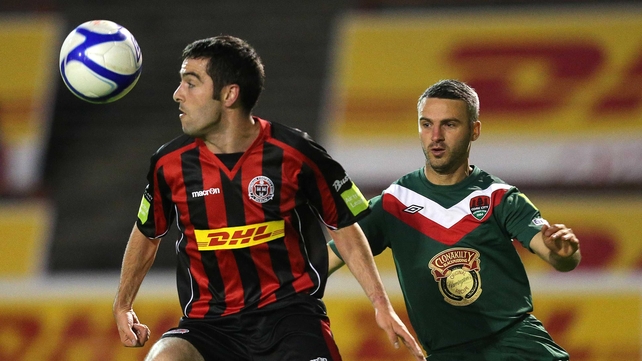 Bohs' Ken Carr is tracked by Danny Murphy of Cork
