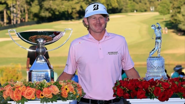 Snedeker with the FedEx Cup (left - the one that netted the $10m bonus!!!) and the Tour Championship trophy