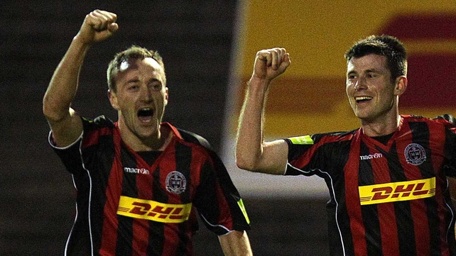 Dave Scully (right) scored a dramatic injury-time brace to give his side a point