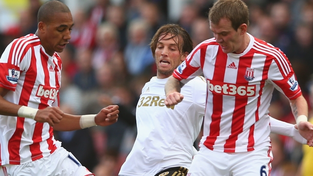 Republic of Ireland midfielder Glenn Whelan is back in contention for Stoke's trip to Norwich, a game which Giovanni Trapattoni is due to attend