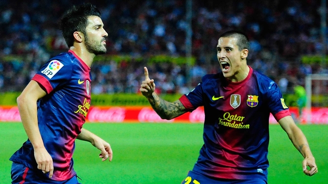 David Villa (L) and Cristian Tello celebrate