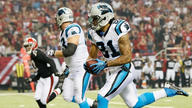 Kealoha Pilares of the Carolina Panthers pulls in this reception he rushed for a touchdown