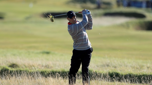 Oscar Pistorius of South Africa plays out from the rough on the fourth hole at Carnoustie