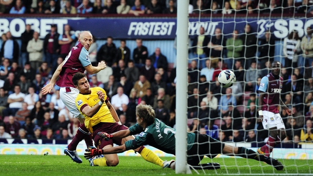 Olivier Giroud prods home his first goal for Arsenal as they came from behind to beat West Ham