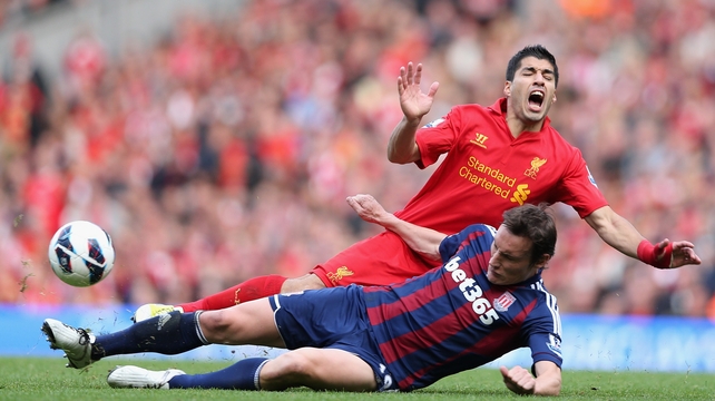 'Someone must tell him (Luis Suarez) to stop it, just play football. He doesn't have to do all that,' says former Liverpool player Roger Hunt.