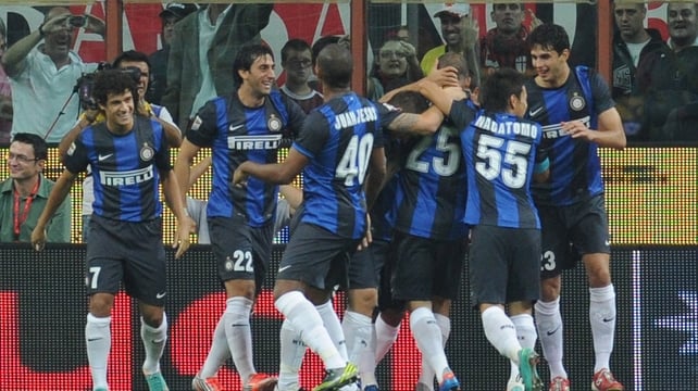 Inter players celebrate after Samuel found the net