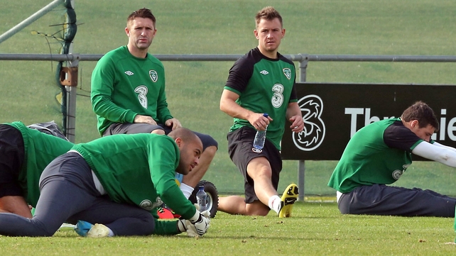Robbie Keane takes a break after picking up an Achilles injury at training