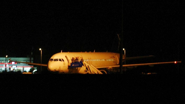 Authorities seized some cargo from the plane Authorities seized some cargo from the plane