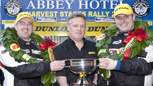 Brian O'Mahony and co-driver John Higgins celebrate their championship victory