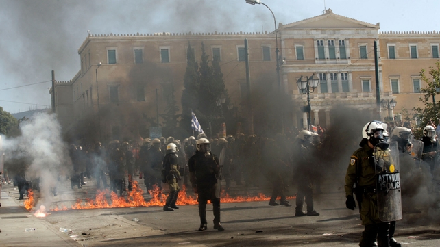 Riot police were called in to control the crowd and guard the Greek parliament Riot police were called in to control the crowd and guard the Greek parliament