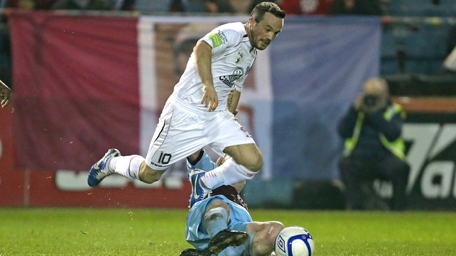 Raffaele Cretaro is tackled by Drogheda's Stephen Quigley