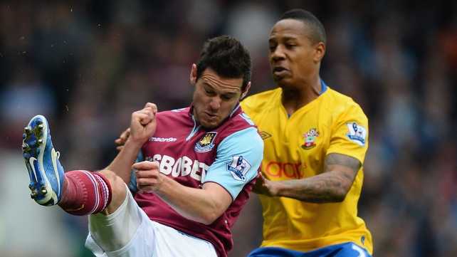 Nathaniel Clyne of Southampton and West Ham's Matt Jarvis battle for possession