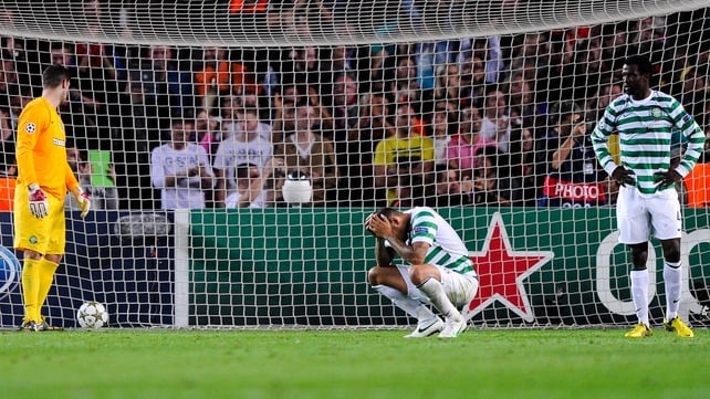 Celtic players distraught after conceding a late goal to Barcelona at the Nou Camp