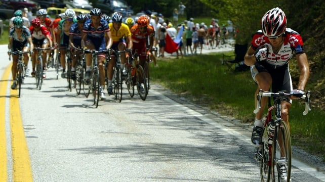 Bobby Julich breaking clear of Lance Armstrong and the peloton back in 2004