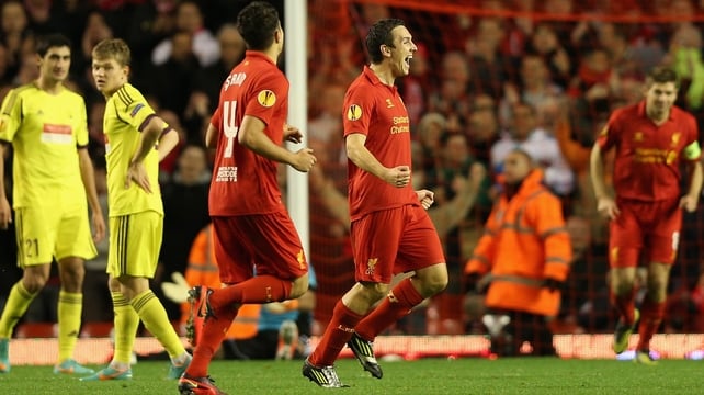 Liverpool's Stewart Downing celebrates his sublime strike at Anfield