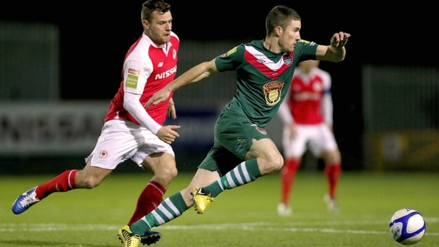 St Patrick's Athletic's James Chambers closes down Cork City's Gearoid Morrissey
