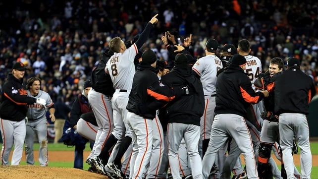 San Francisco players celebrate in the tenth inning after clinching the all important win