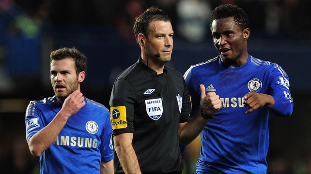 John Obi Mikel has a word with Clattenburg as Juan Mata looks on during the clash with Manchester United