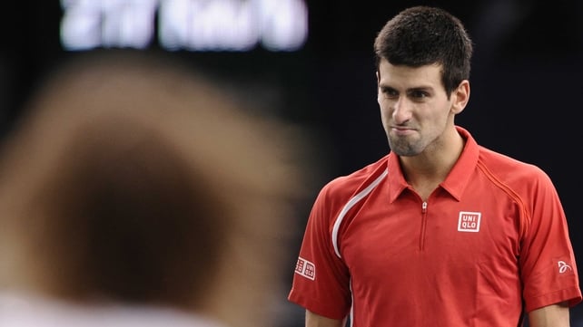 Novak Djokovic won the opening set to love but then lost the next two sets to crash out in Paris