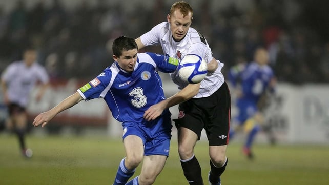 Chris Shields of Dundalk and Waterford's Sean Maguire battle for possession in Tuesday's first leg at Oriel Park